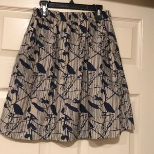 Beige skirt with blue pattern